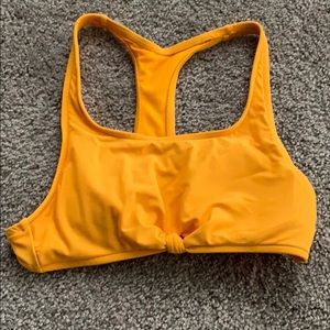 Knotted yellow bathing suit top